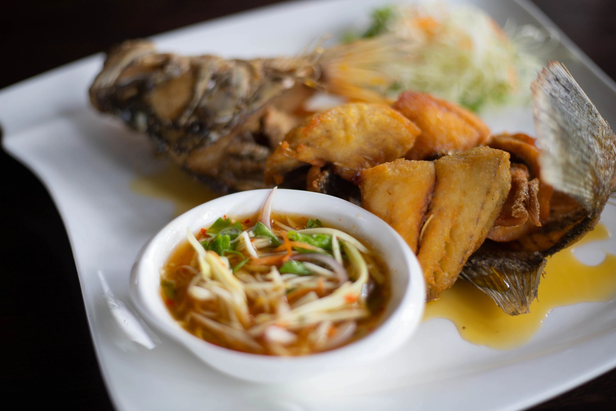 Whole fried fish served hot and crispy