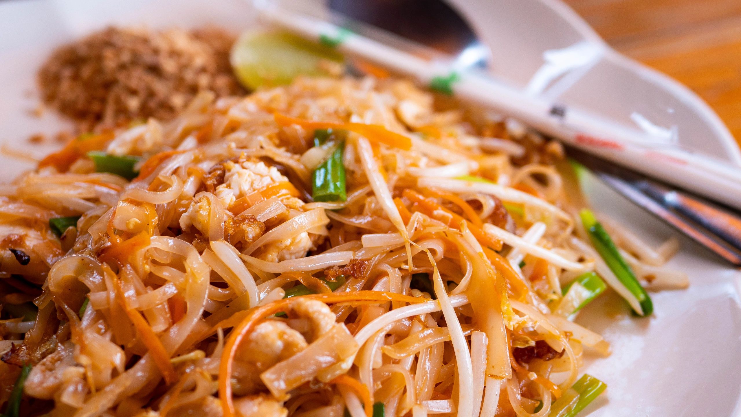 Colorful Thai dish plated with herbs and spices